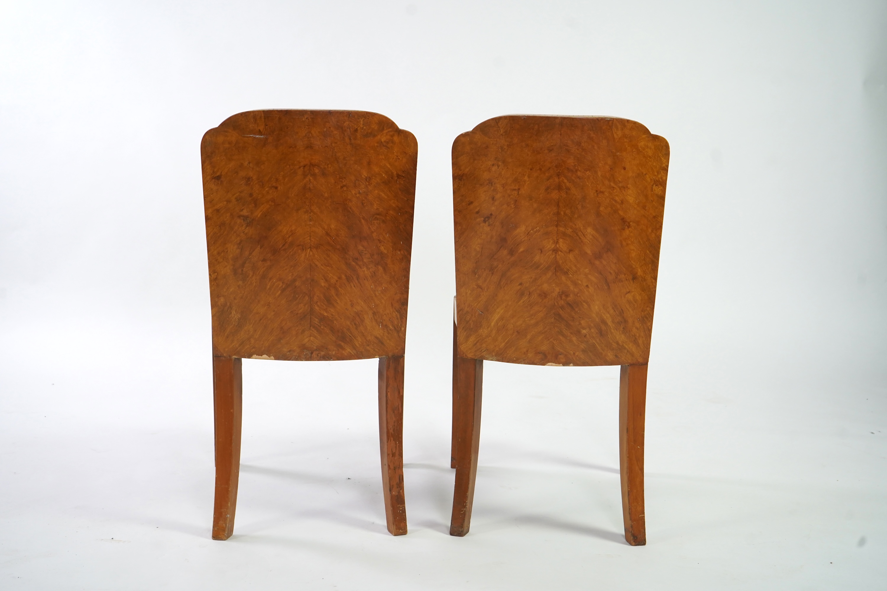 Attributed to Harry and Lou Epstein: An Art Deco burr walnut dining suite